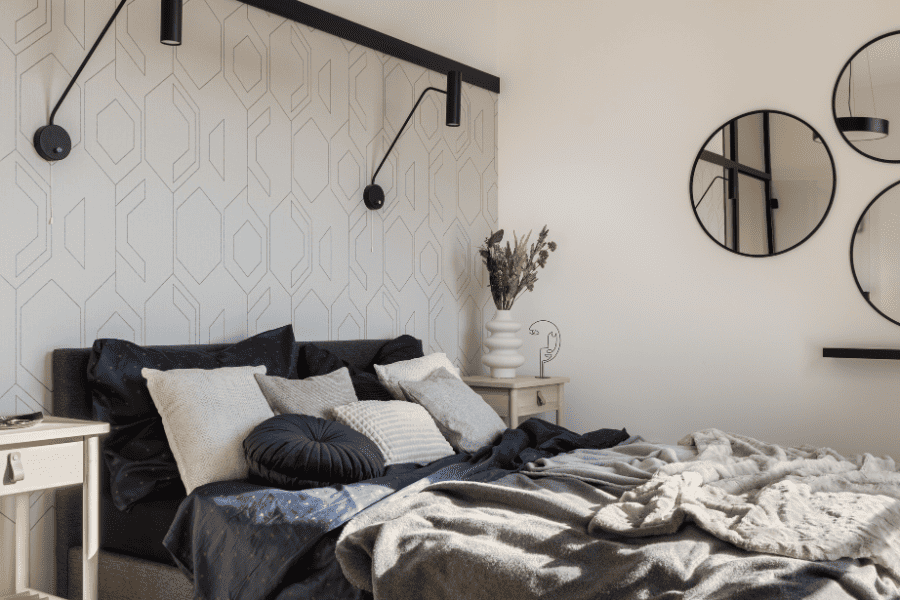 glam bedroom decor with grey bed